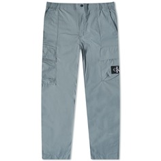 Узкие брюки карго с эффектом потертости Calvin Klein