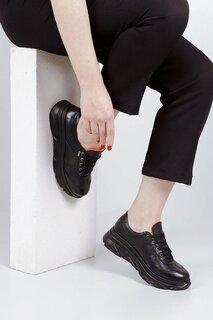 Женские кроссовки из натуральной кожи с круглым носком и мягкой подошвой на шнуровке 24186 GÖNDERİ(R), черный
