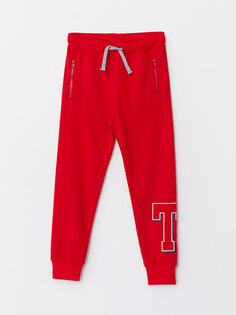 Спортивные брюки-джоггеры с принтом и эластичной резинкой на талии для мальчиков LCW Kids, яркий красный