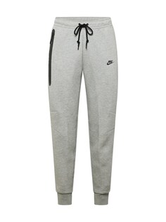 Зауженные брюки Nike Sportswear TECH FLEECE, пестрый серый