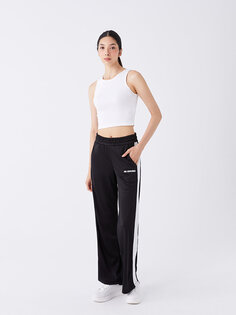 Широкие женские спортивные штаны с принтом и эластичным поясом XSIDE