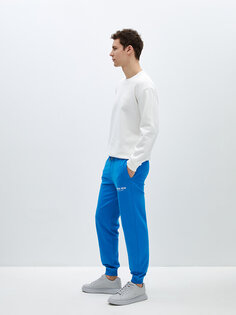 Мужские спортивные штаны с принтом и эластичной резинкой на талии CALİMERA MODA, синий