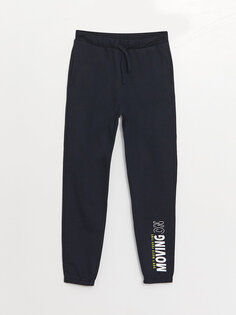 Спортивные брюки-джоггеры с принтом и эластичной резинкой на талии для мальчиков LCW ECO, темно-синий