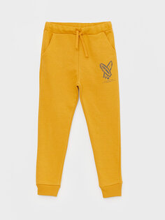 Спортивные брюки-джоггеры с принтом и эластичной резинкой на талии для мальчиков LCW ECO, темно-желтый