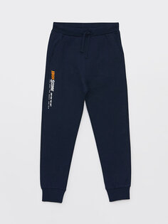 Спортивные брюки-джоггеры с принтом и эластичной резинкой на талии для мальчиков LCW Kids, новый темно-синий