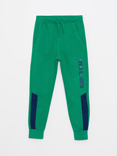 Спортивные брюки-джоггеры с принтом и эластичной резинкой на талии для мальчиков LCW Kids, зеленый