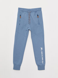 Спортивные брюки-джоггеры с принтом и эластичной резинкой на талии для мальчиков LCW Kids, светлый индиго