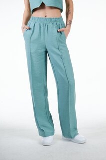 Зеленые женские льняные брюки свободного кроя с деталью в рубчик Chandraswear