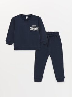 Комплект из 2 предметов: толстовка с длинными рукавами и спортивные штаны для маленьких мальчиков с круглым вырезом и принтом LCW baby, темно-синий