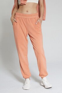 Оранжевые женские спортивные штаны для бега из органического хлопка с высокой талией, окрашенные в минералы Chandraswear