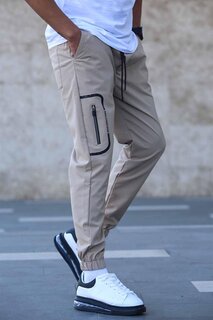Бежевые брюки-джоггеры из ткани Parachute с карманами и деталями 5483 MADMEXT