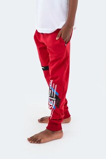 Детские спортивные штаны унисекс DEVAN красные SLAZENGER
