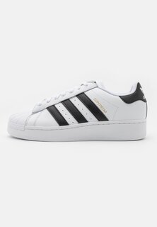 Низкие кроссовки SUPERSTAR XLG UNISEX adidas Originals, обувь белый/черный/золотой металлик