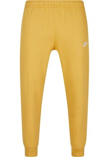 Зауженные брюки Nike Sportswear Club Fleece, желтое золото