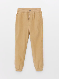 Базовые бархатные брюки-джоггеры для мальчиков с эластичной резинкой на талии LCW Kids, светло-бежевый