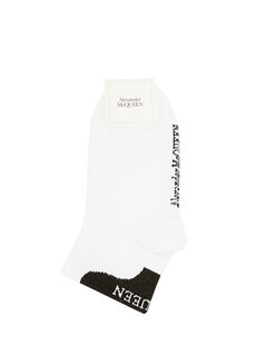 Бело-черные женские жаккардовые носки с логотипом Alexander McQueen