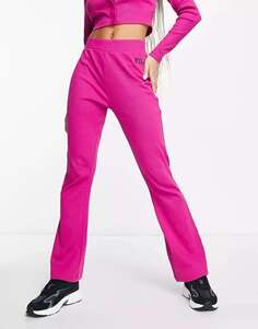 Розовые брюки-клеш в рубчик с логотипом Fila