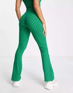 Зеленые брюки-клеш в стиле ретро Fila