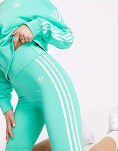 Зеленые шорты-леггинсы с тремя полосками adidas Originals adicolor