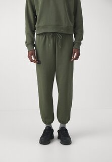 Спортивные штаны Under Armour ROCK TERRY, зеленый/переходящий