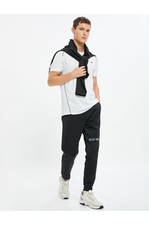 Спортивные брюки-джоггеры с принтом на кармане и завязкой на талии Koton, черный