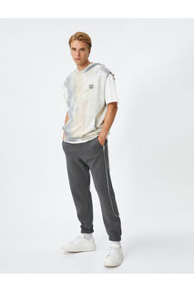 Спортивные брюки-джоггеры с кружевной строчкой на талии и карманом Koton, серый
