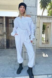 Женские белые текстурированные брюки для бега с двойными карманами, эластичной резинкой на талии и штанинах Trend Alaçatı Stili, белый