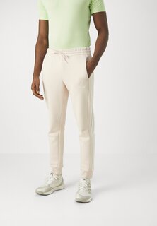 Спортивные брюки Essentials Tapered Cuff Pants adidas Sportswear, цвет putty mauve