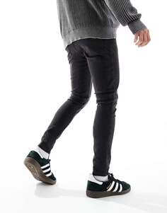 Стираные черные джинсы с эффектом стрейч и рваными краями ASOS