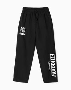 Чёрные спортивные брюки-трансформеры oversize с принтом Gloria Jeans