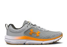 Кроссовки Assert 10 AC GS Under Armour, светло-серый/оранжевый